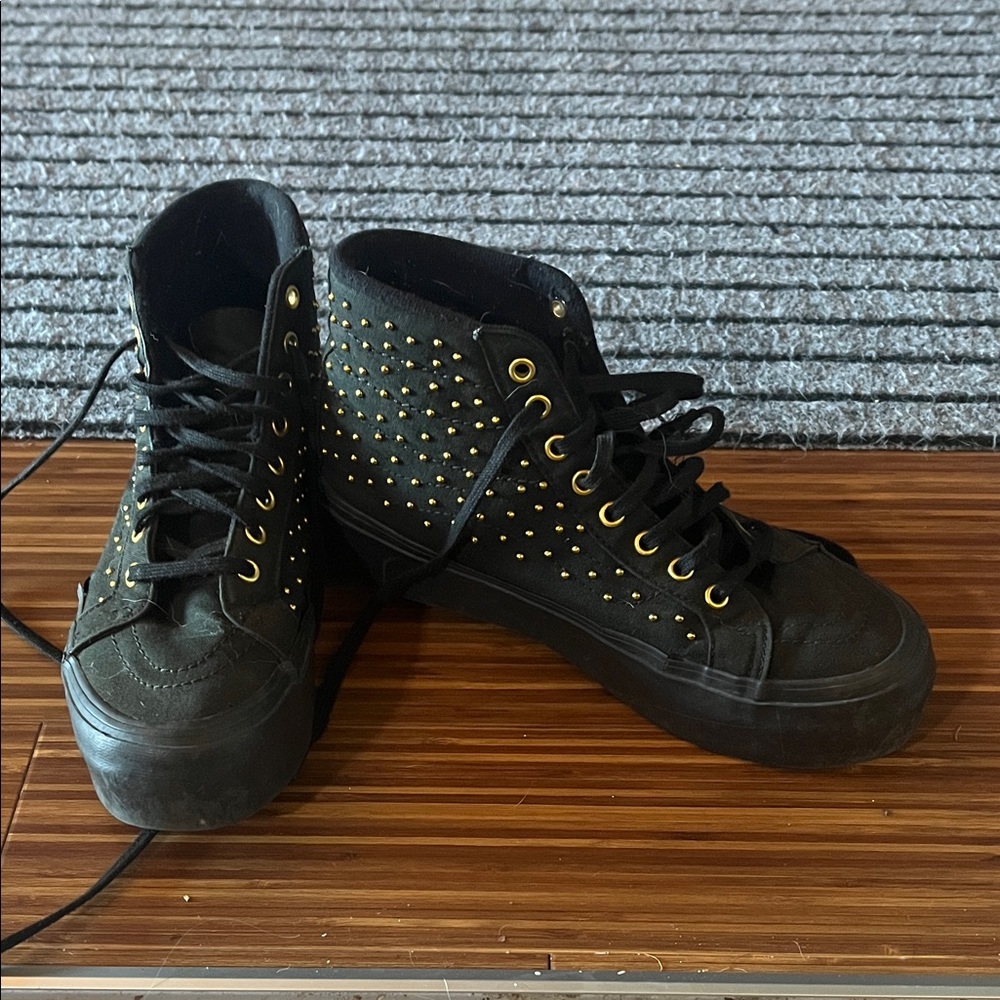 Van’s Black High-Top Sneakers with Gold Accents